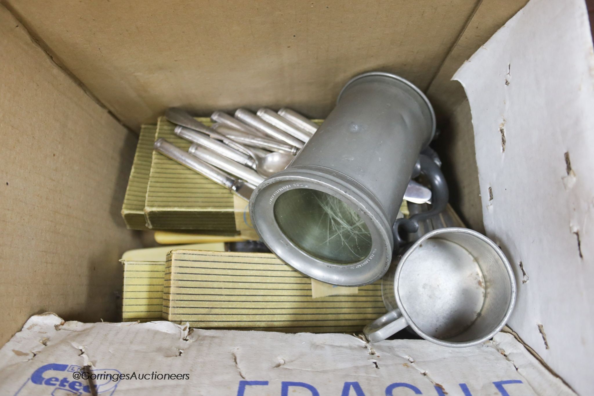 Two boxes of assorted 19th century and late plated wares including an oval box, a pair of wine coasters and assorted flatware.